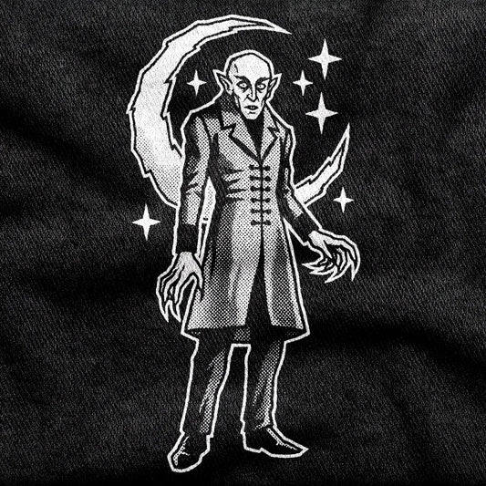 Nosferatu design printed on a black cotton tee, close-up