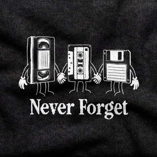 Never Forget design printed on a black cotton tee, close-up