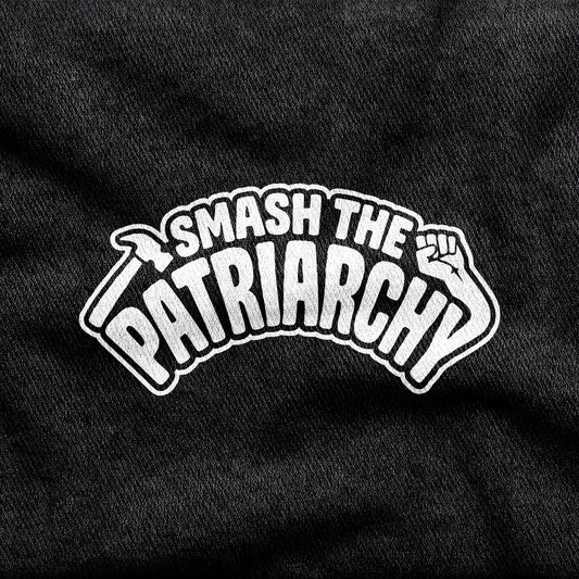 Smash the Patriarchy design printed on a black cotton tee, close-up