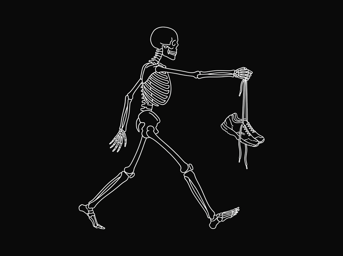 Line drawing of a skeleton walking while holding out a worn running shoe by its laces