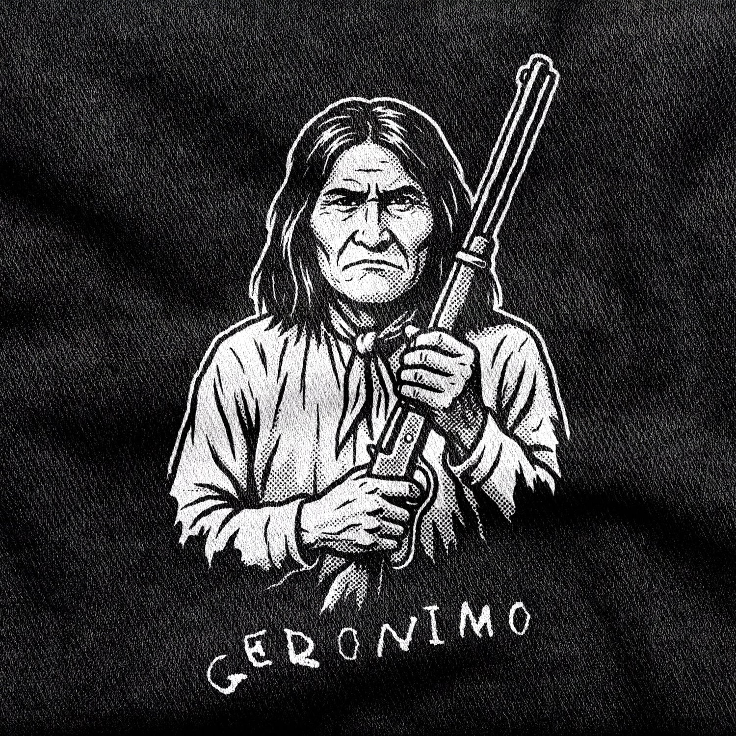 Geronimo design printed on a black cotton tee, close-up