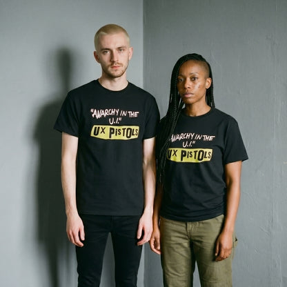 Two models wearing the UX Pistols black graphic tee