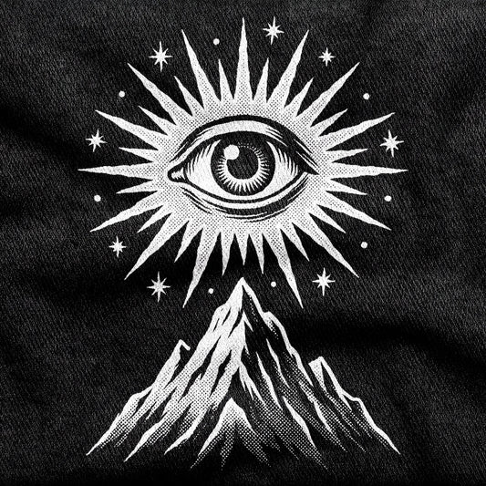 Amon Düül II design printed on a black cotton tee, close-up