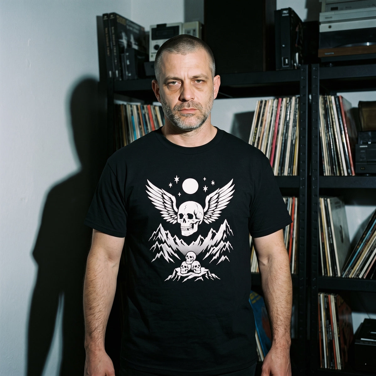 Man wearing the Bachdenkel black graphic tee