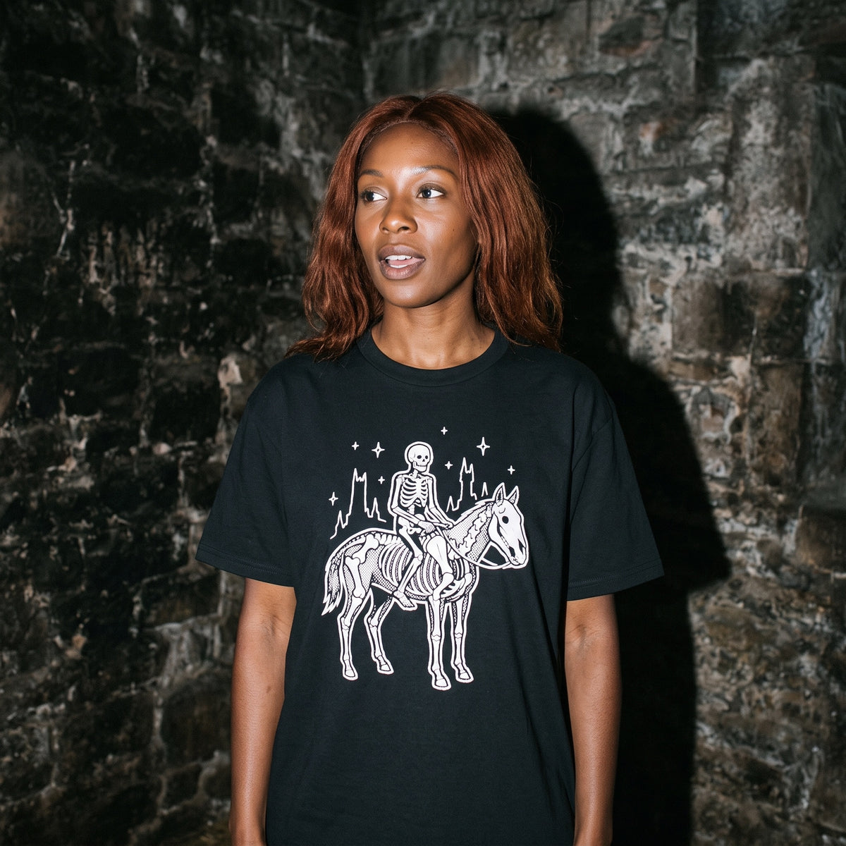 Woman wearing the Death black graphic tee