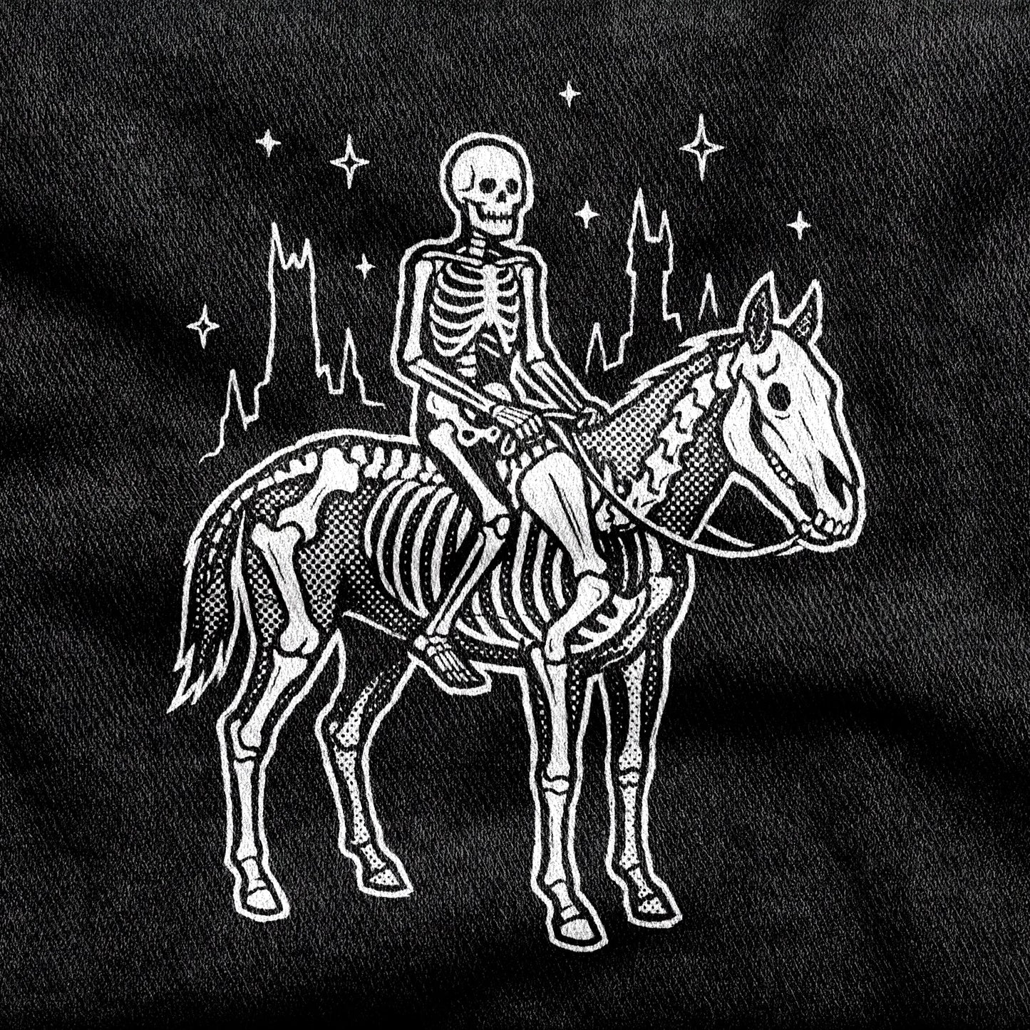 Death design printed on a black cotton tee, close-up