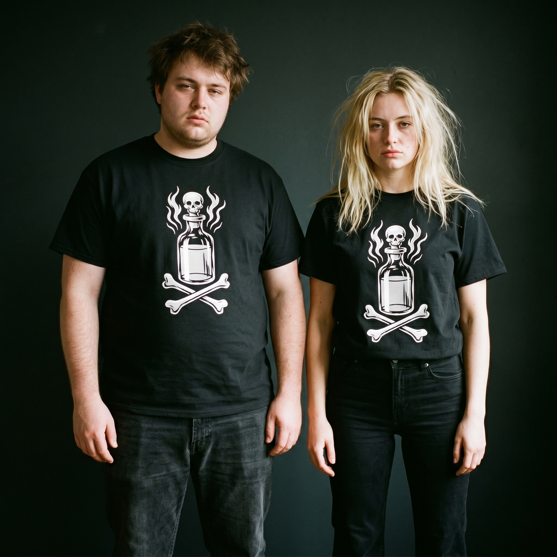 Two models wearing the Drink Your Poison black graphic tee