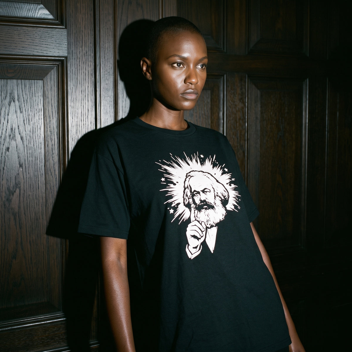 Woman wearing the Marx My Words black graphic tee