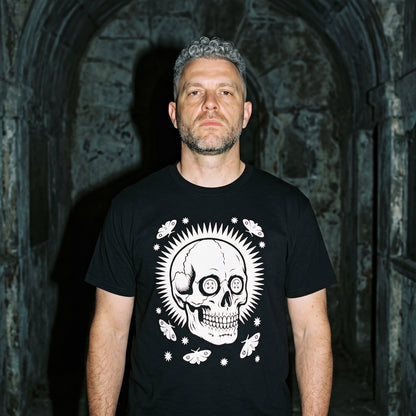 Man wearing the Memento Vivere black graphic tee