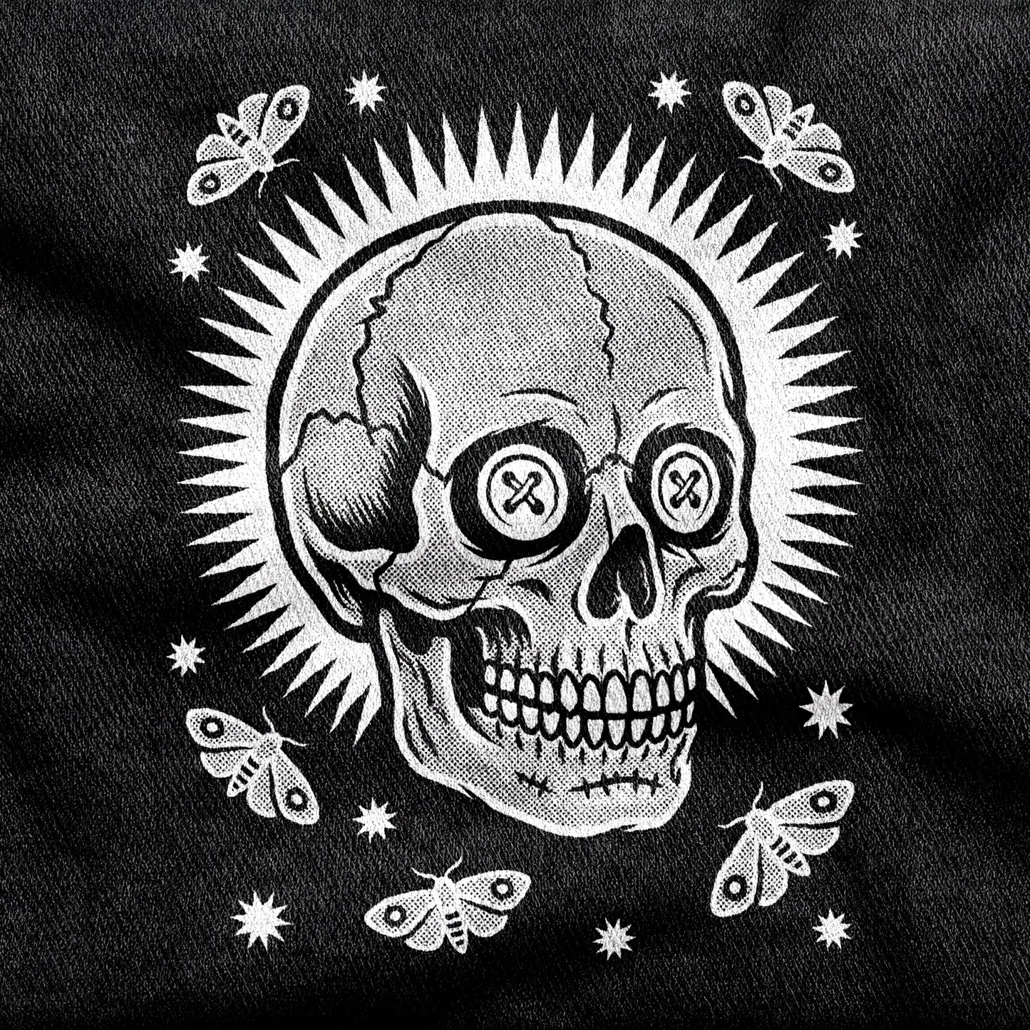 Memento Vivere design printed on a black cotton tee, close-up
