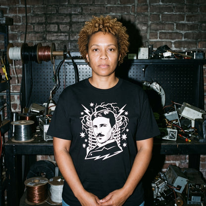 Woman wearing the Nikola Tesla black graphic tee