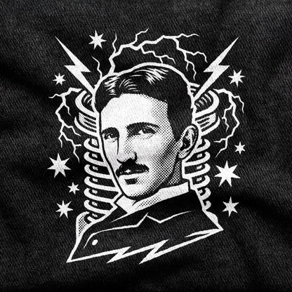 Nikola Tesla design printed on a black cotton tee, close-up