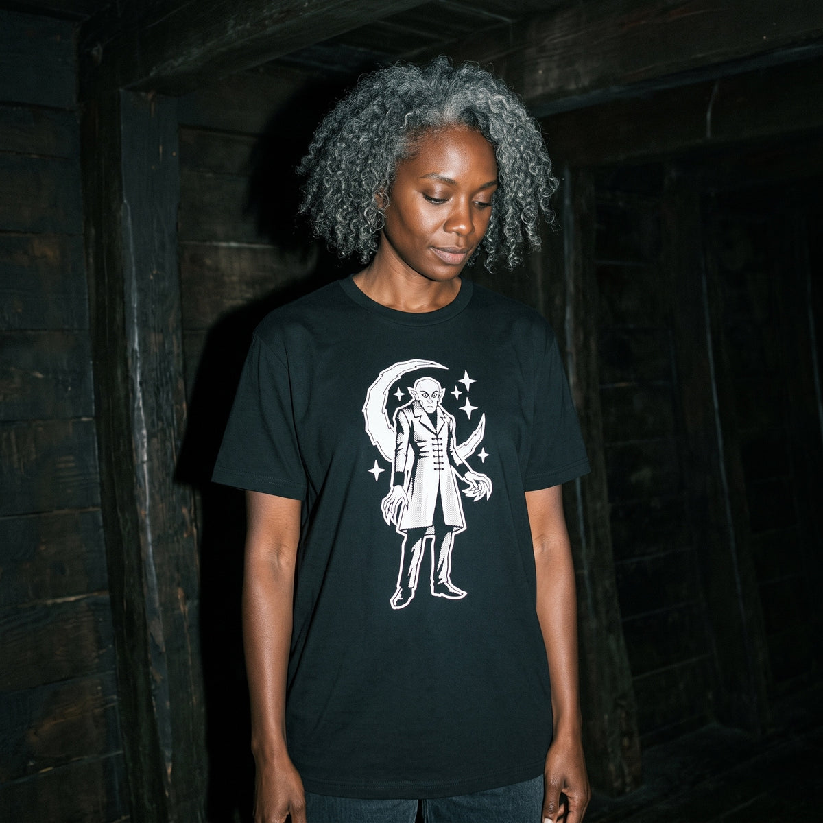Woman wearing the Nosferatu black graphic tee