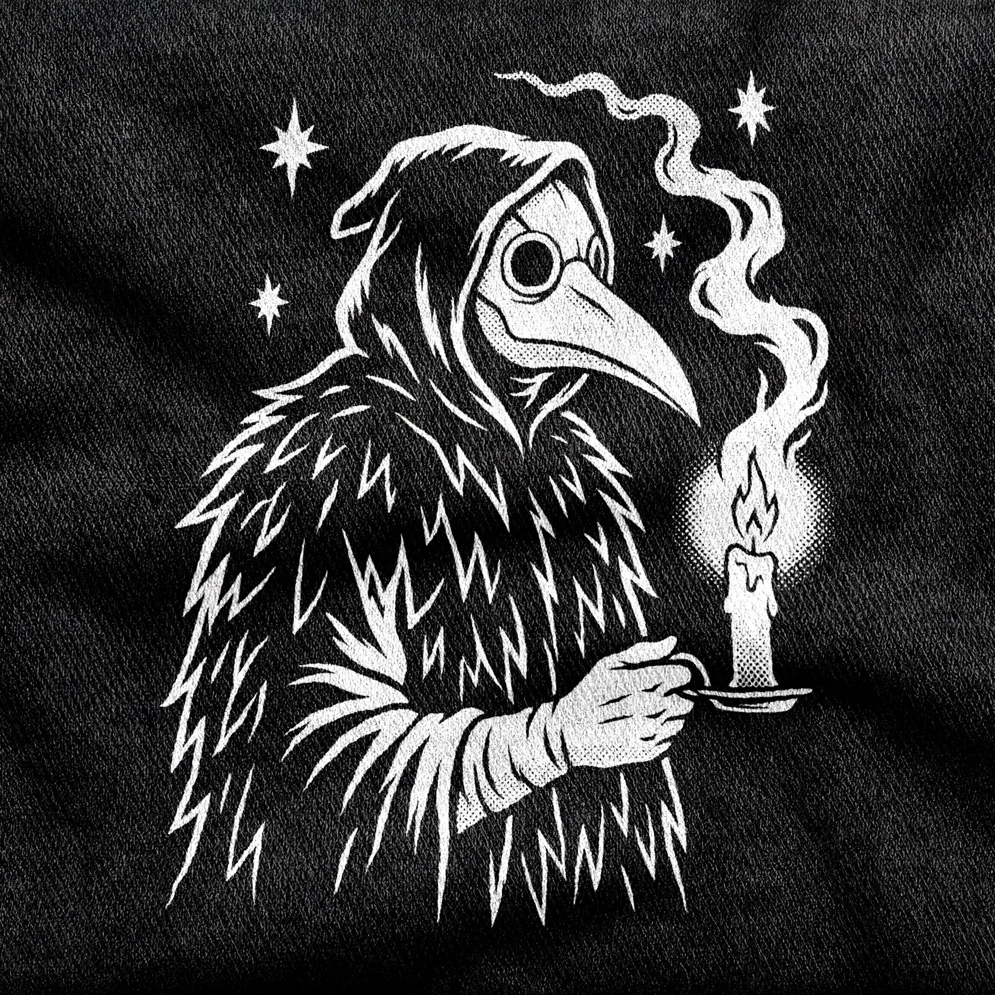 Plague Doctor design printed on a black cotton tee, close-up