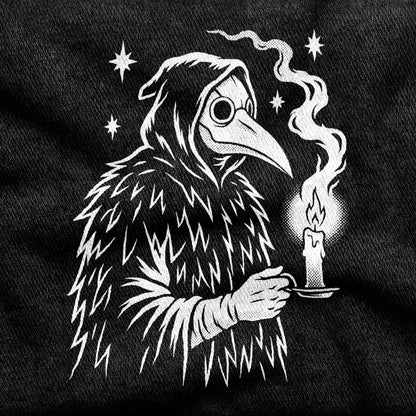 Plague Doctor design printed on a black cotton tee, close-up
