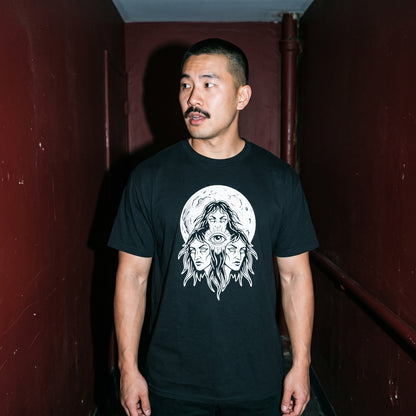 Man wearing the Three Mothers black graphic tee