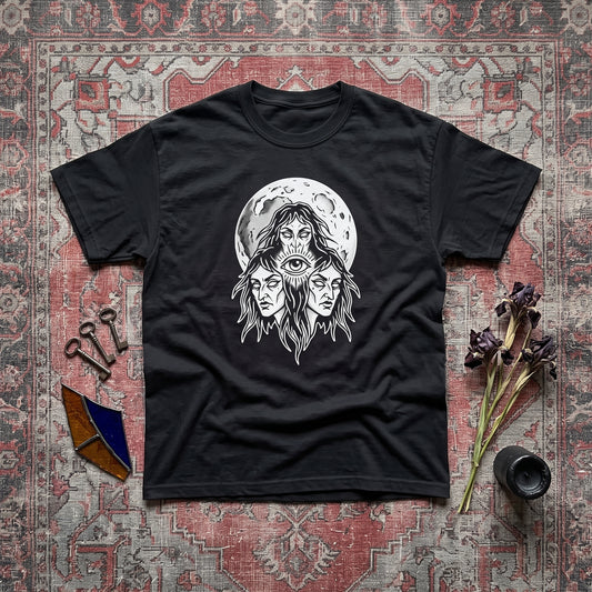 Three Mothers black graphic tee, styled flat lay