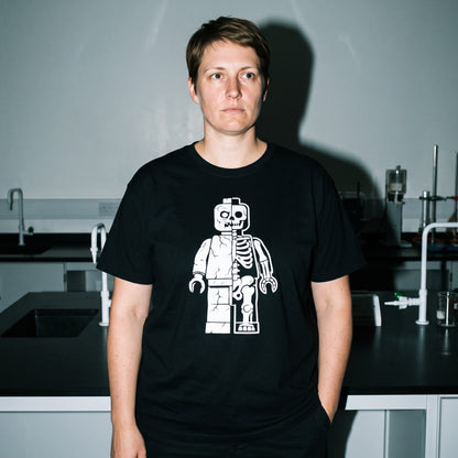 Woman wearing the Zombie Let Go black graphic tee