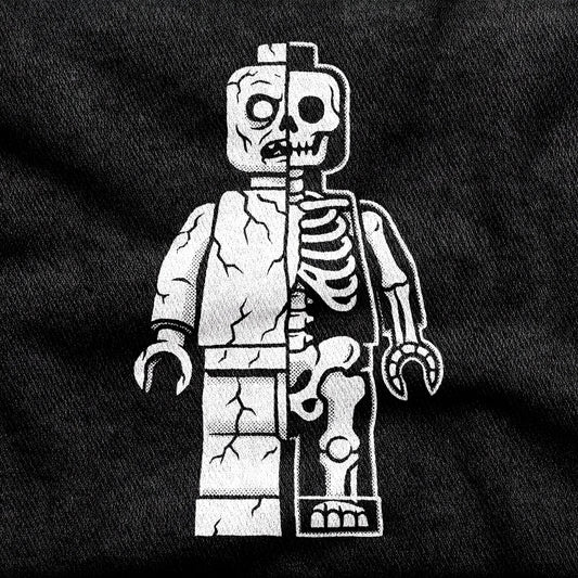 Zombie Let Go design printed on a black cotton tee, close-up