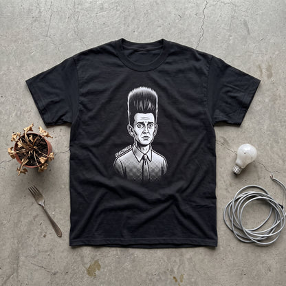 Eraserhead black graphic tee, styled flat lay