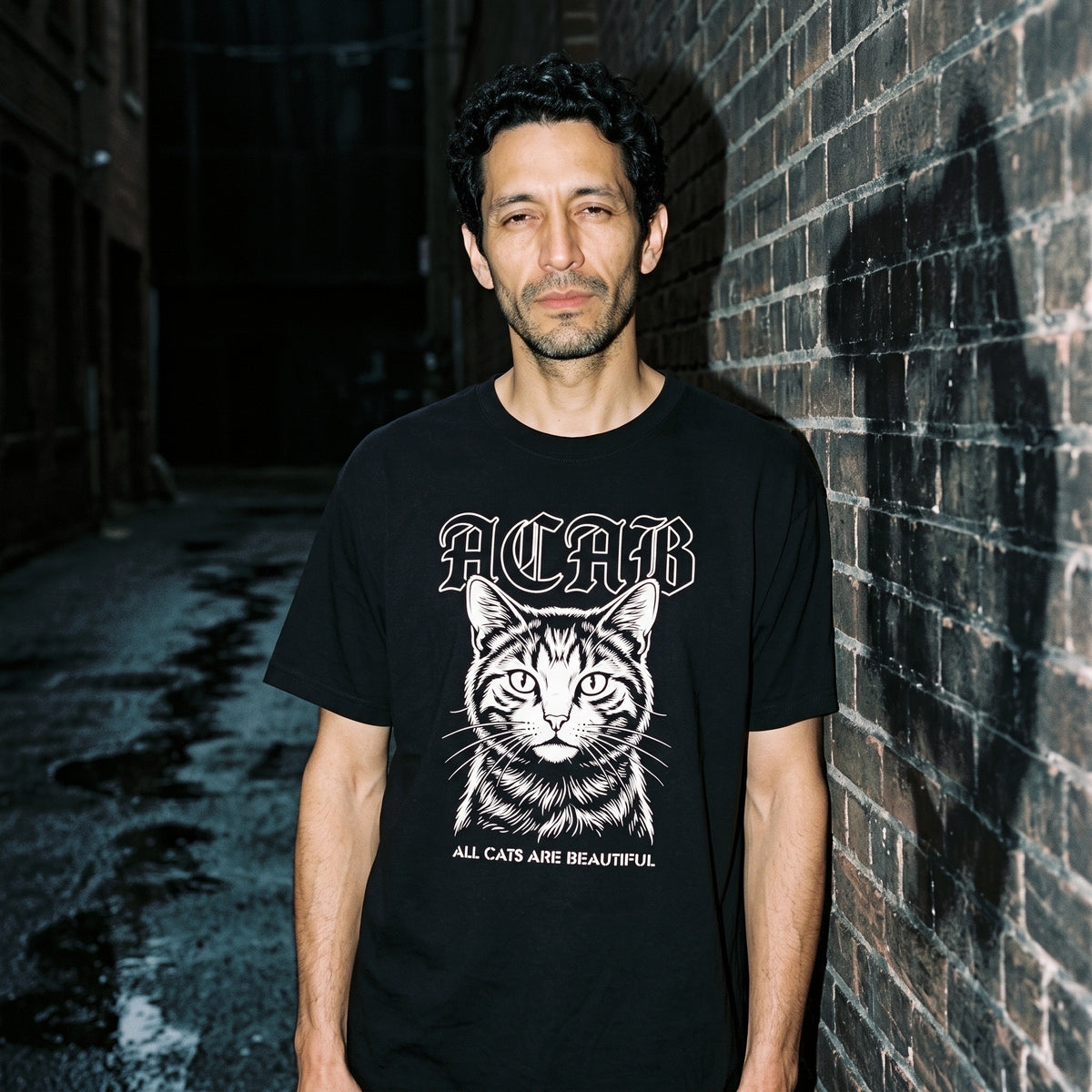Man wearing the ACAB black graphic tee