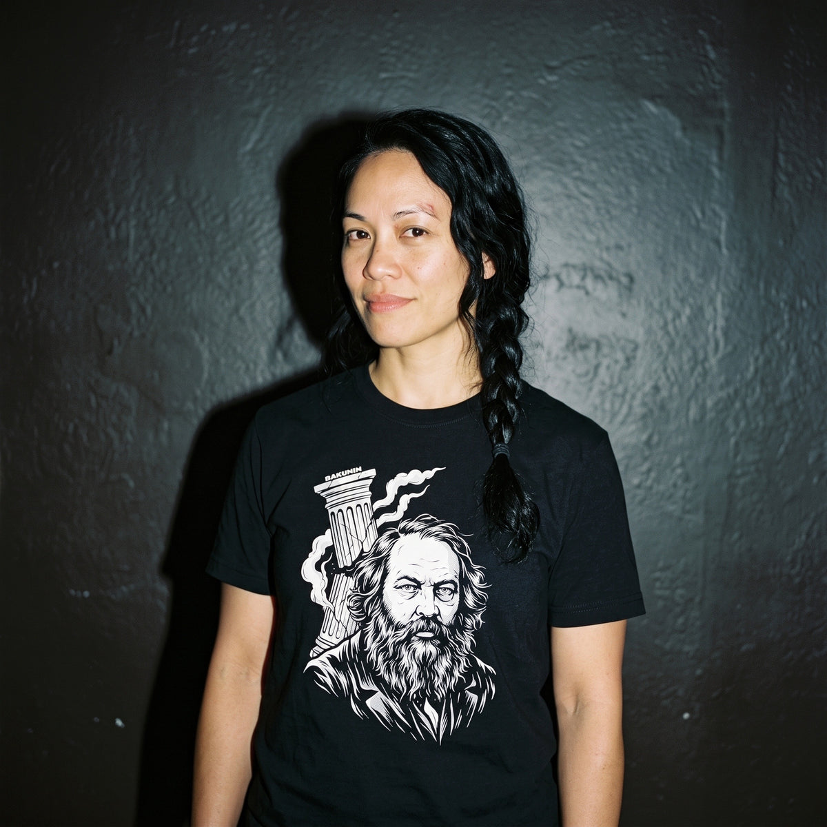 Woman wearing the Mikhail Bakunin black graphic tee