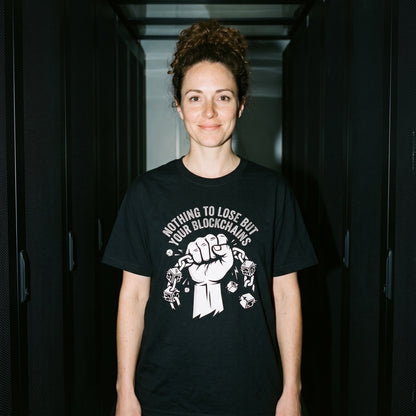 Woman wearing the Nothing to Lose But Your Blockchains black graphic tee