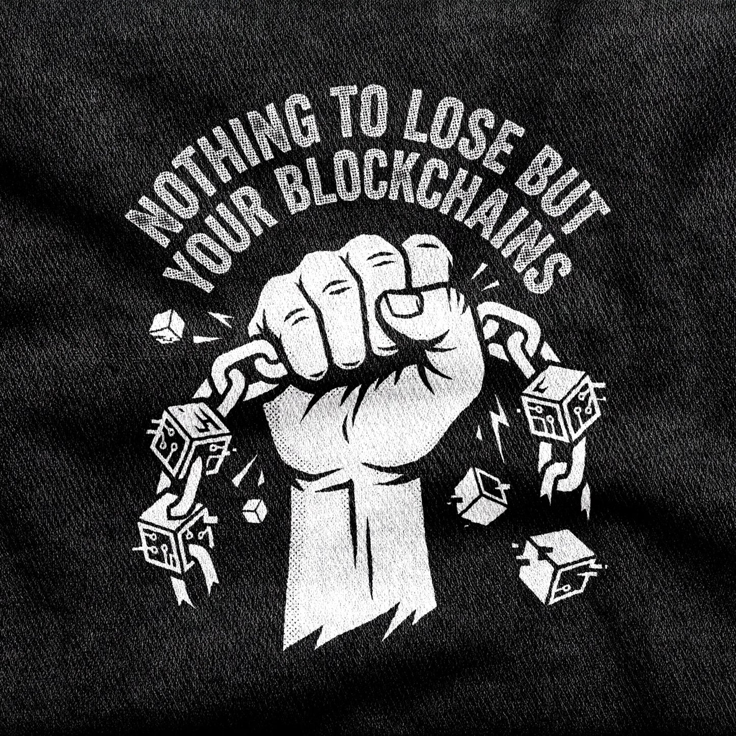 Nothing to Lose But Your Blockchains design printed on a black cotton tee, close-up