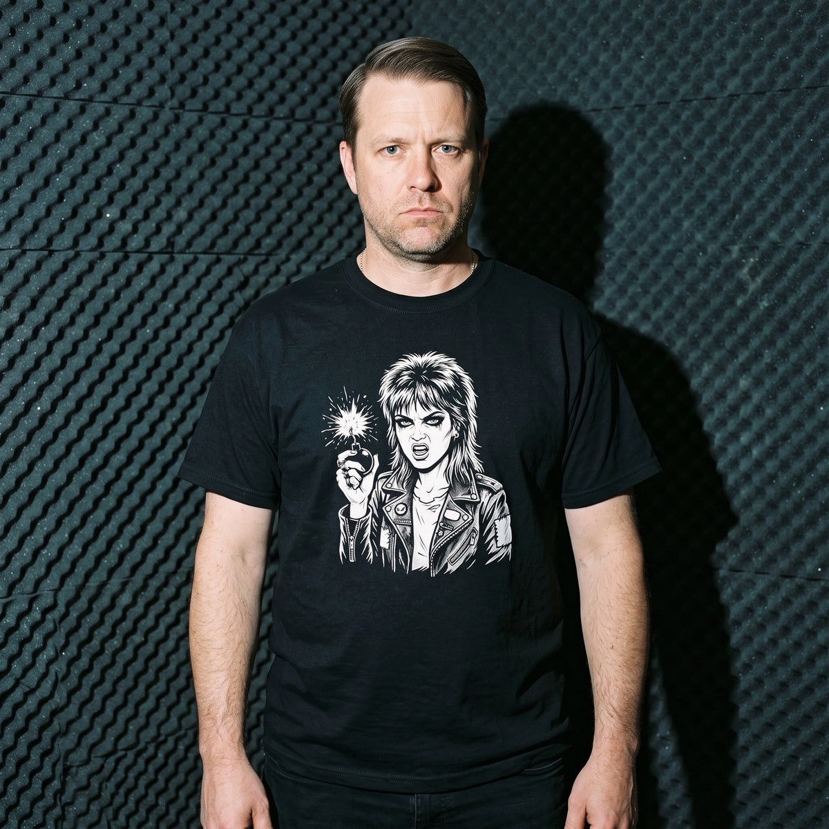 Man wearing the Cherry Bomb black graphic tee