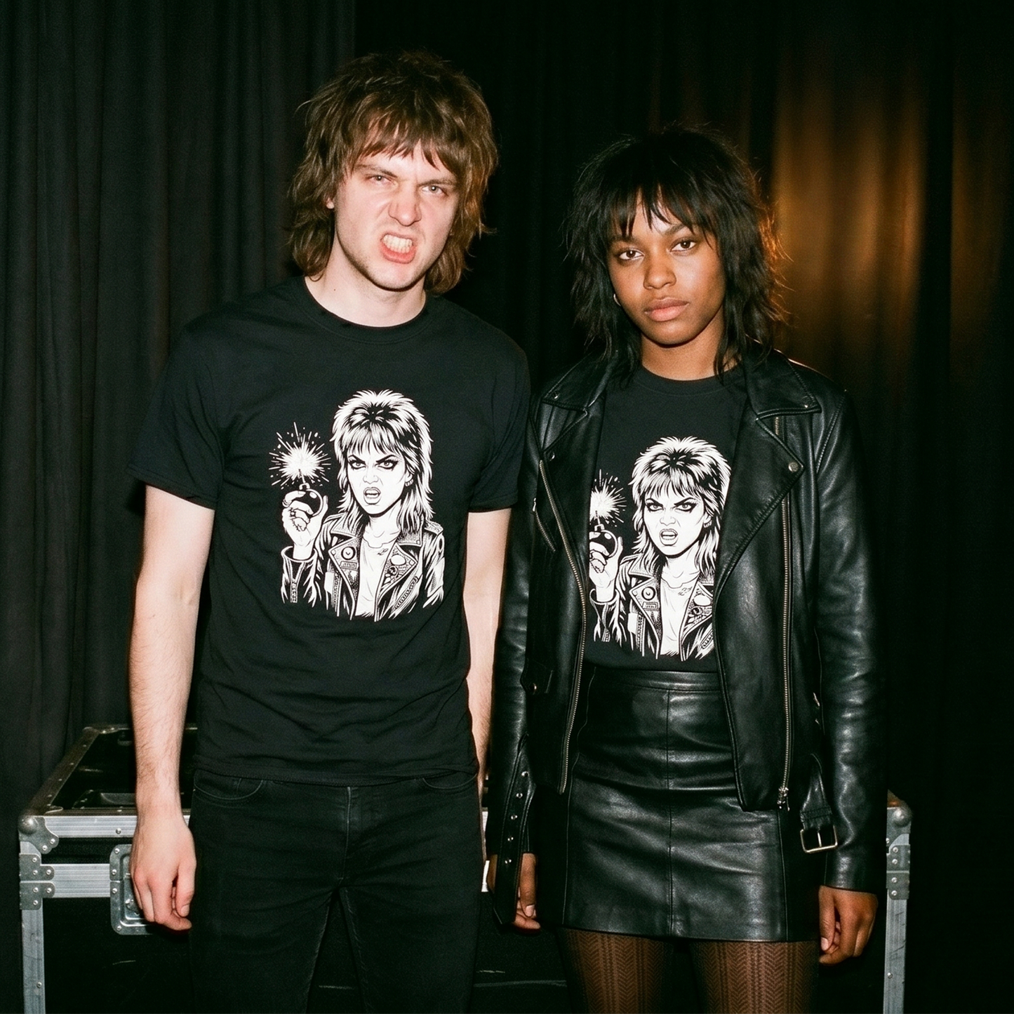 Two models wearing the Cherry Bomb black graphic tee