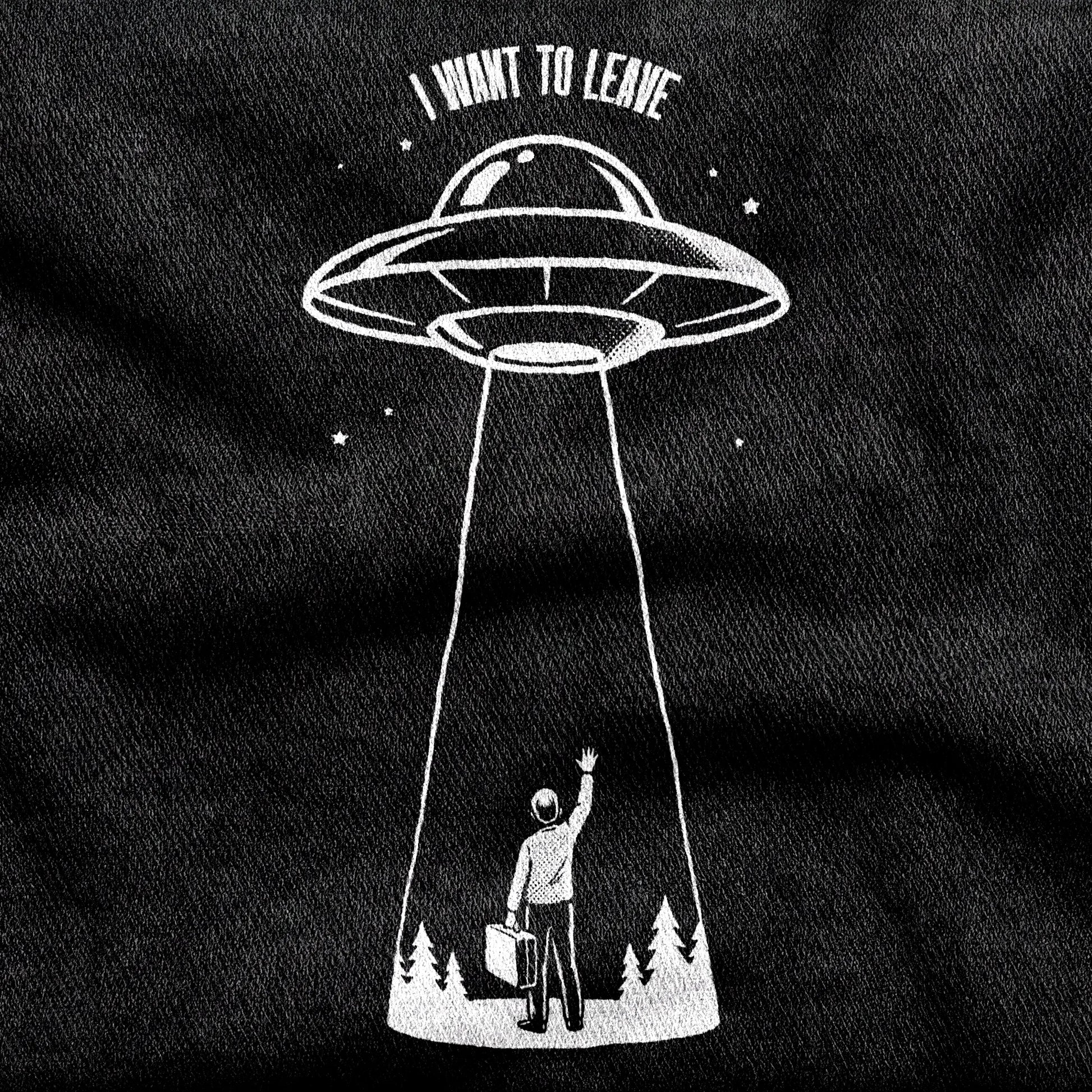 I Want to Leave design printed on a black cotton tee, close-up
