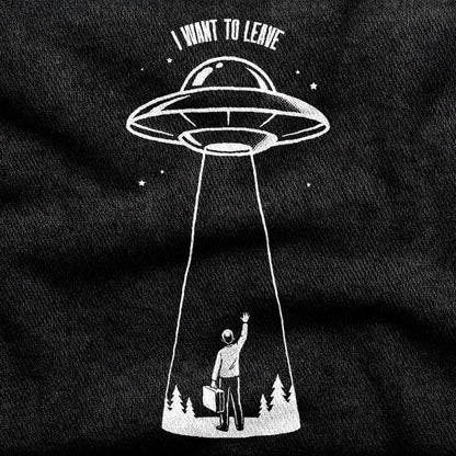 I Want to Leave design printed on a black cotton tee, close-up