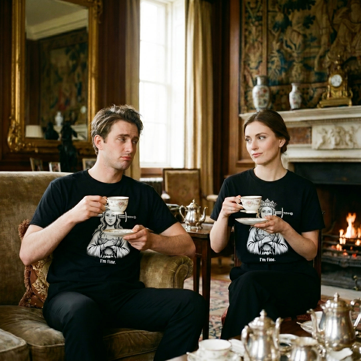Two models wearing the I'm Fine black graphic tee