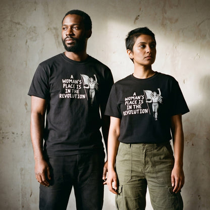 Two models wearing the A Woman's Place is in the Revolution black graphic tee