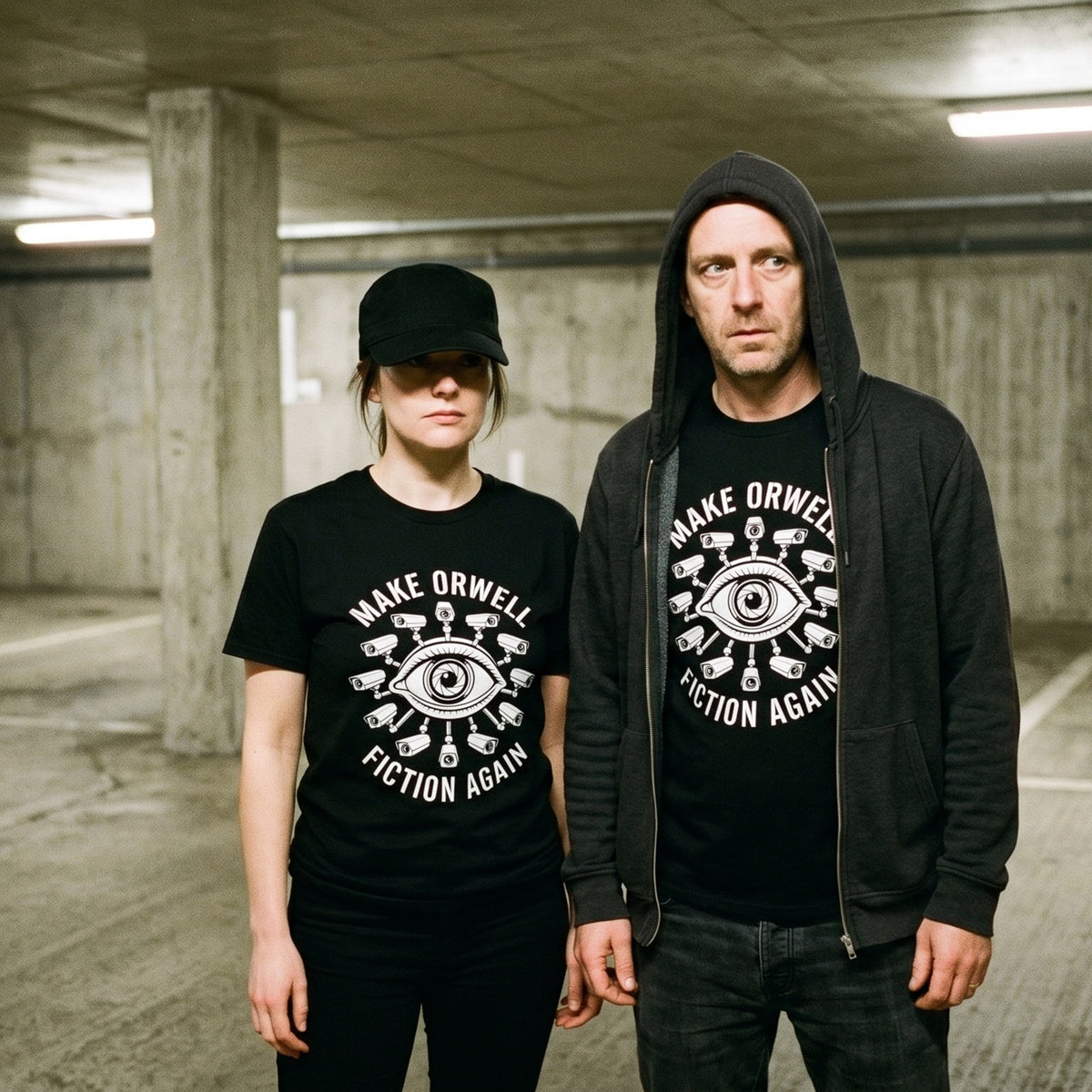 Two models wearing the Make Orwell Fiction Again black graphic tee
