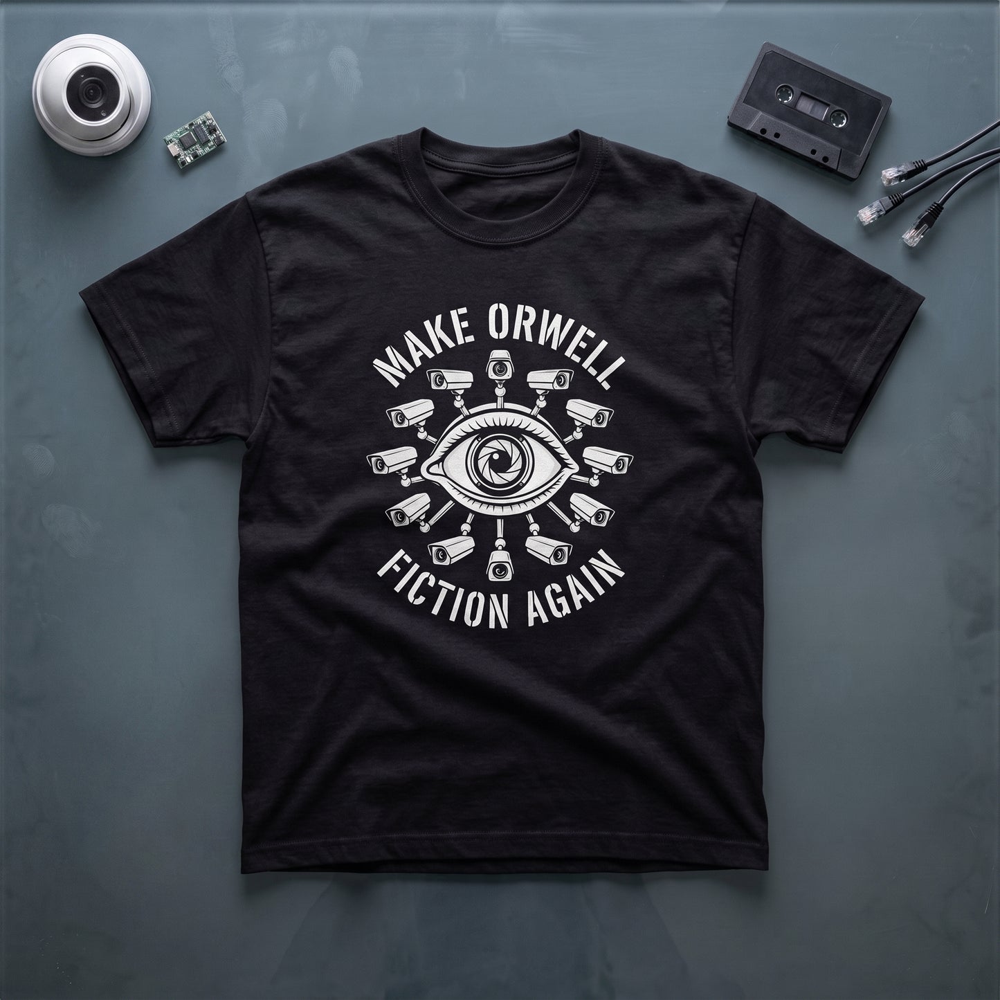 Make Orwell Fiction Again black graphic tee, styled flat lay
