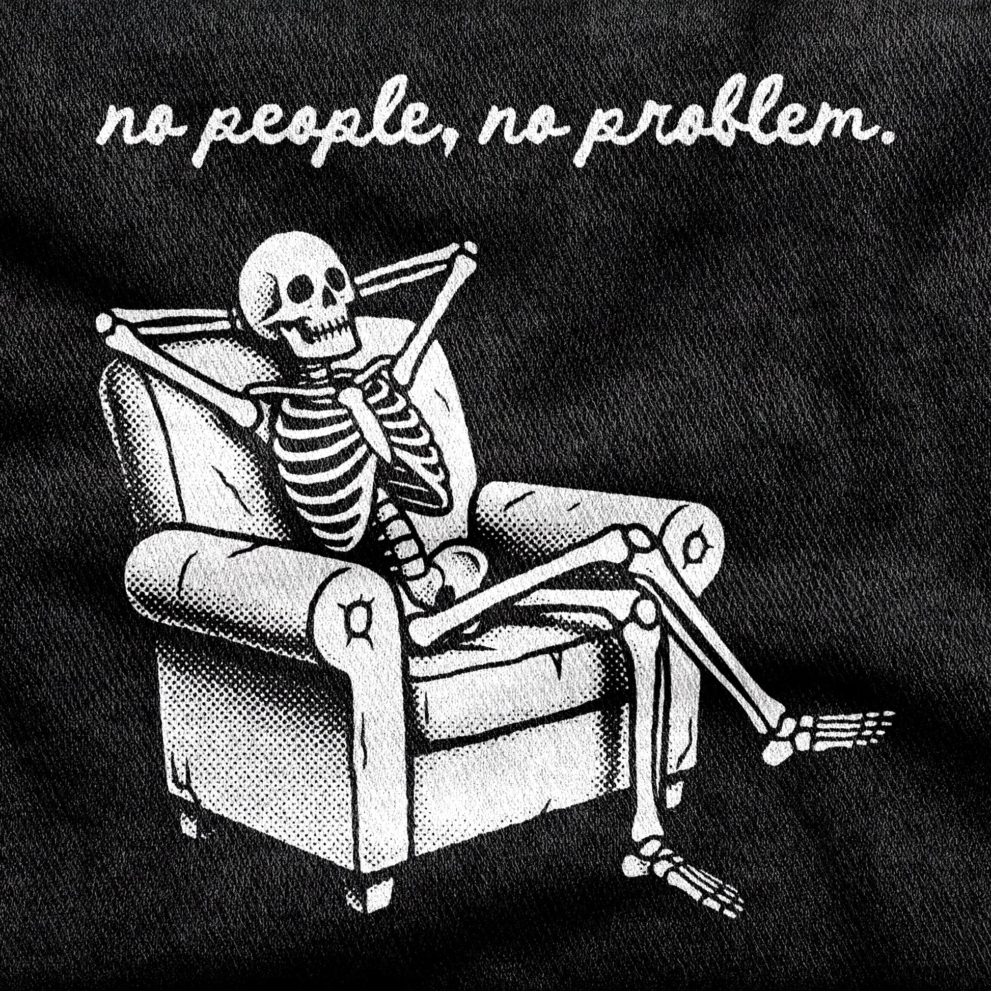 No People, No Problem design printed on a black cotton tee, close-up