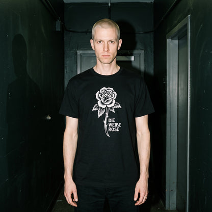 Man wearing the Die Weiße Rose black graphic tee