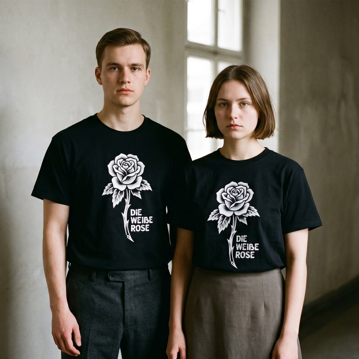 Two models wearing the Die Weiße Rose black graphic tee