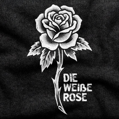 Die Weiße Rose design printed on a black cotton tee, close-up