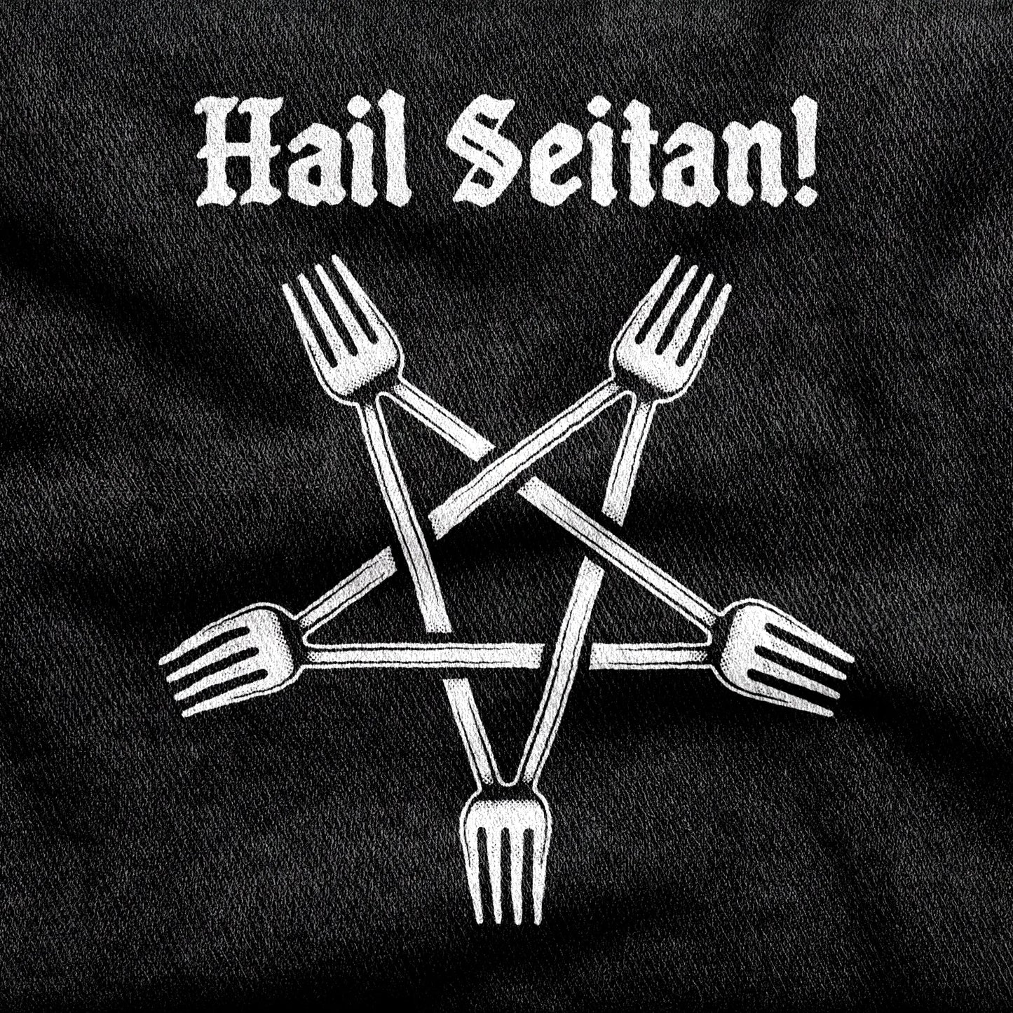 Hail Seitan design printed on a black cotton tee, close-up
