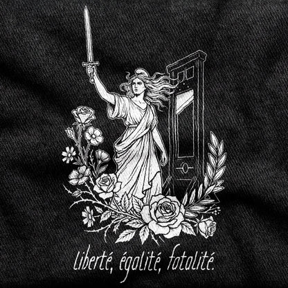 Liberté Égalité Fatalité design printed on a black cotton tee, close-up