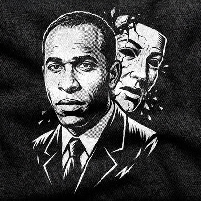 Frantz Fanon design printed on a black cotton tee, close-up