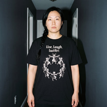 Woman wearing the Live Laugh Lucifer black graphic tee