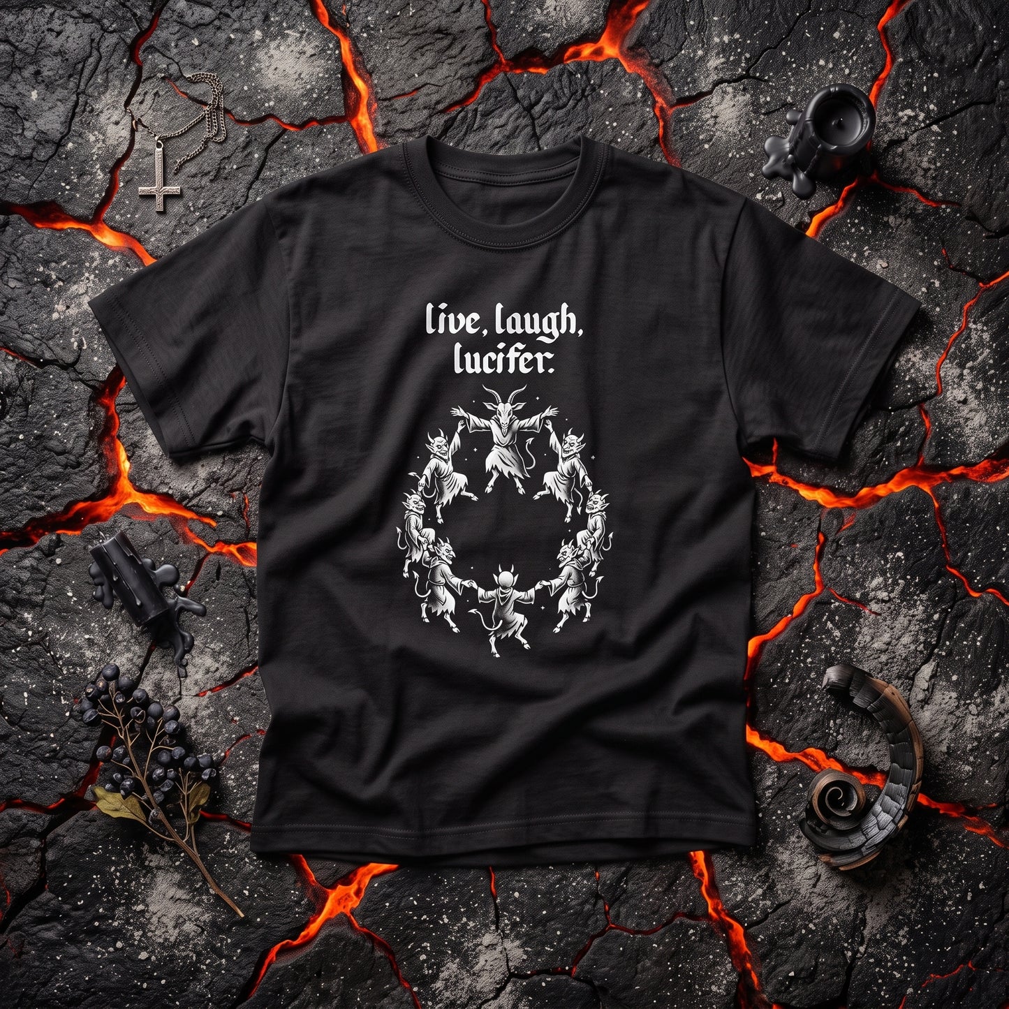 Live Laugh Lucifer black graphic tee, styled flat lay