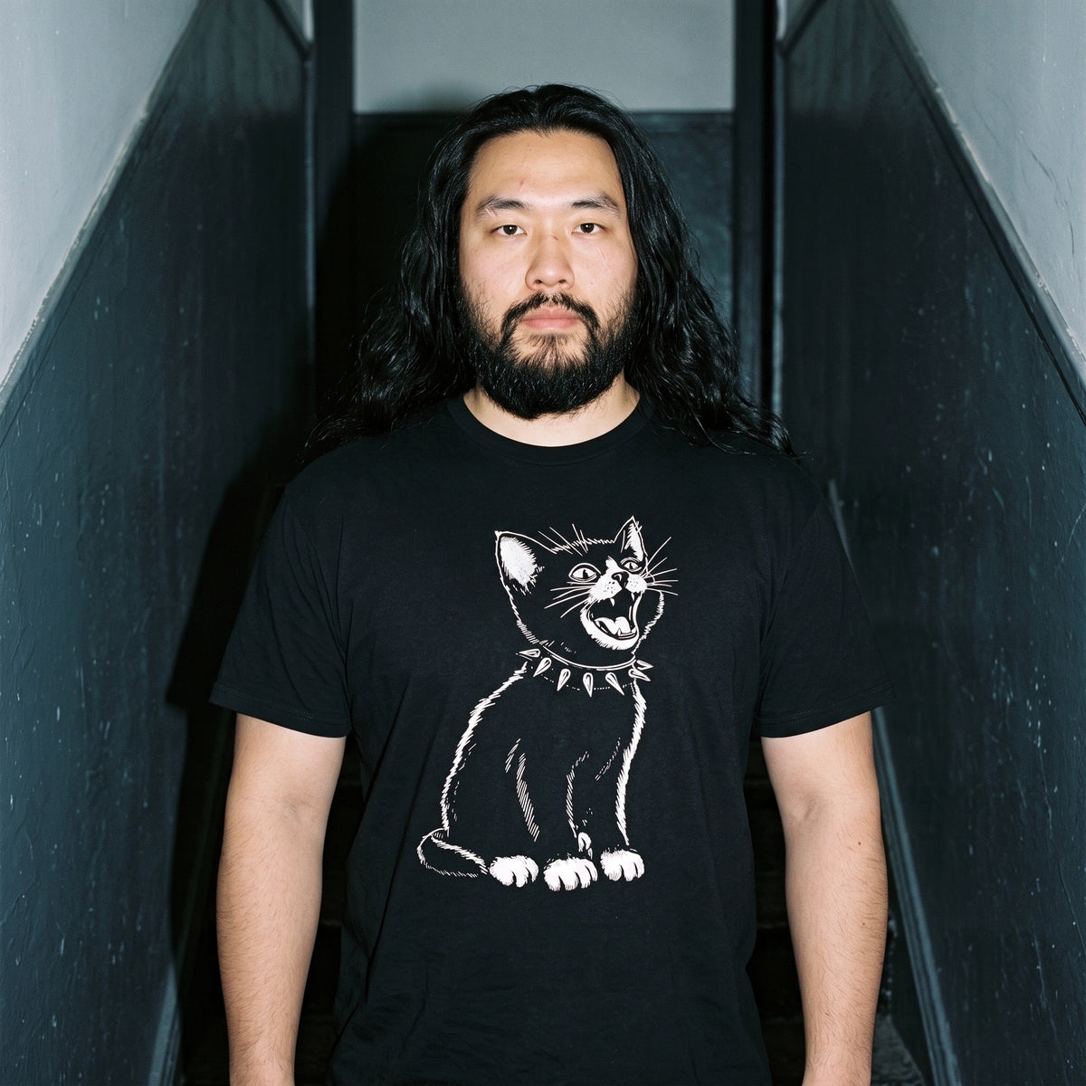 Man wearing the Kittenpunk black graphic tee