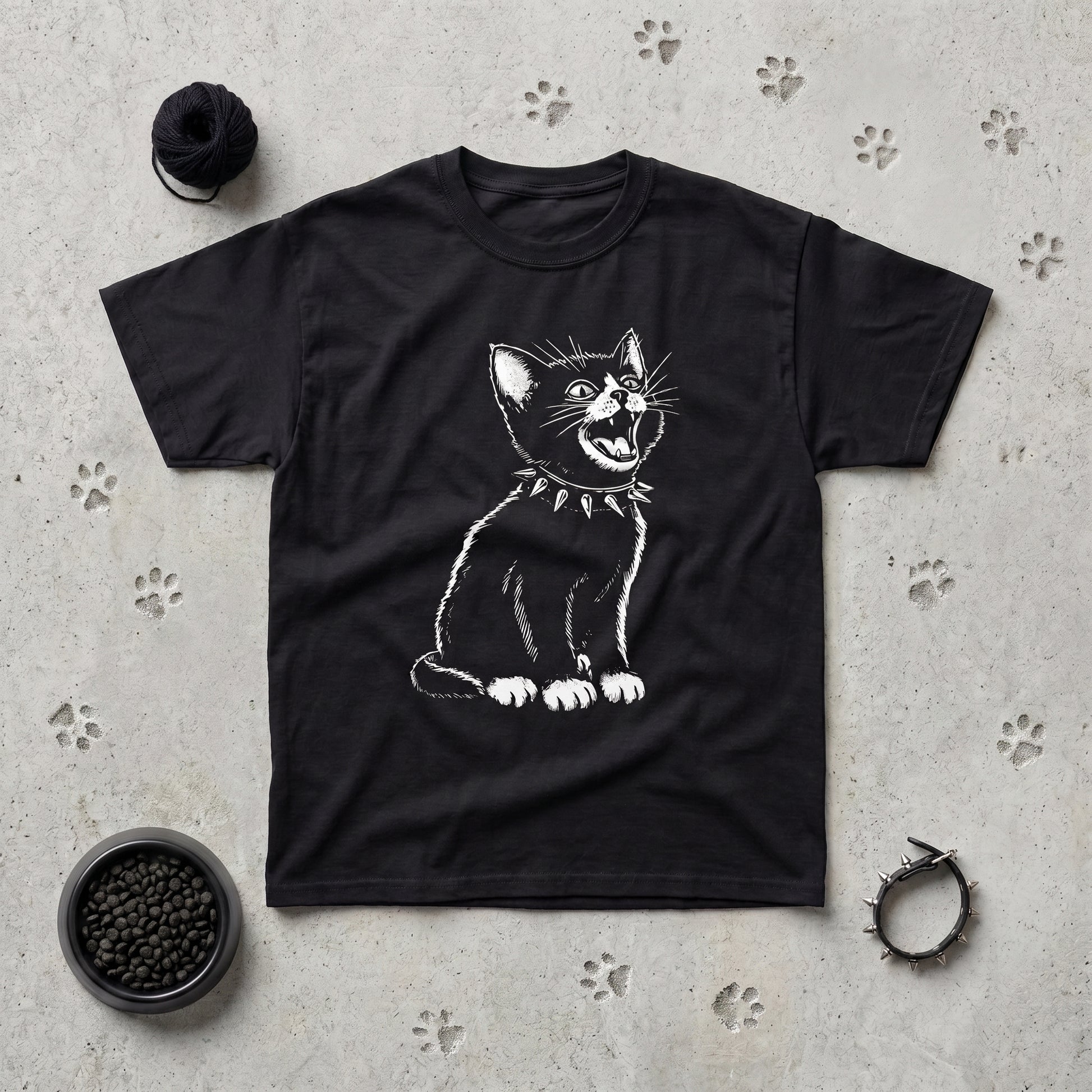 Kittenpunk black graphic tee, styled flat lay