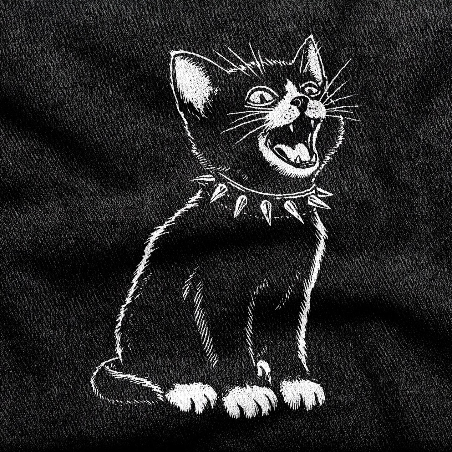 Kittenpunk design printed on a black cotton tee, close-up