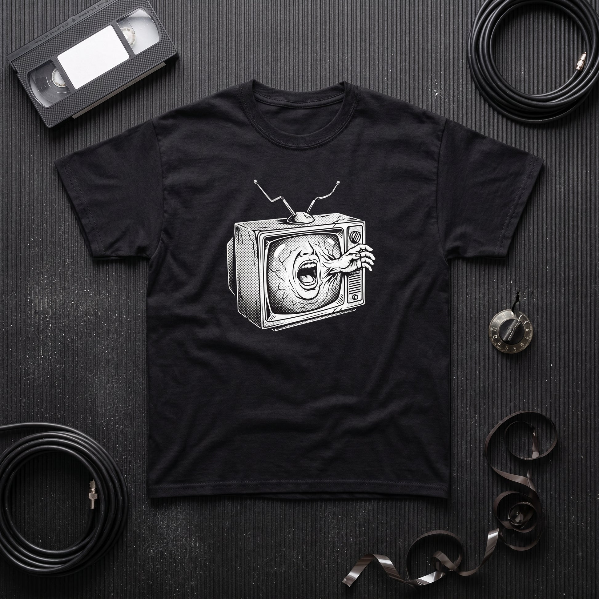 Videodrome black graphic tee, styled flat lay