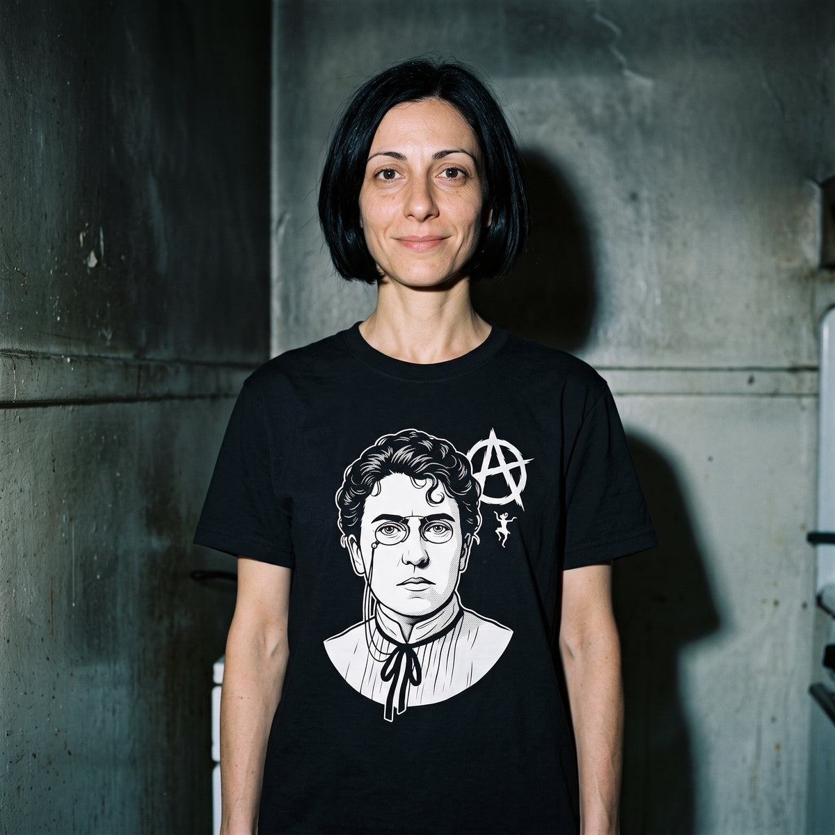 Woman wearing the Emma Goldman black graphic tee